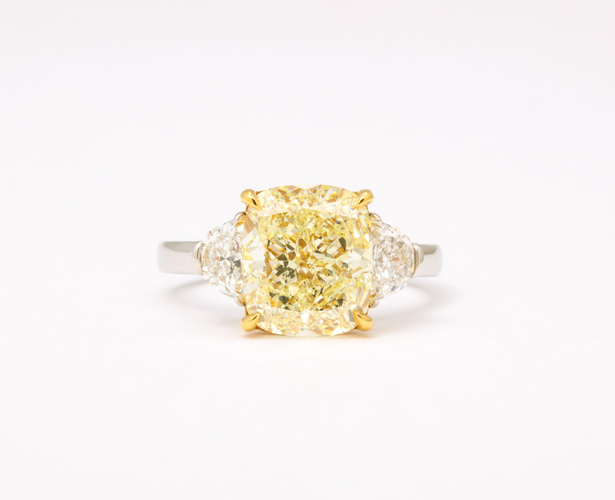 https://a.1stdibscdn.com/5-carat-yellow-diamond-ring-for-sale-picture-9/j_415/j_154958521650391214999/6R1A6666_master.jpg