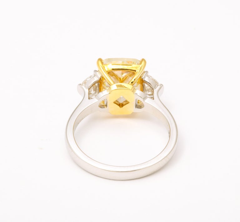 https://a.1stdibscdn.com/5-carat-yellow-diamond-ring-for-sale-picture-9/j_415/j_154958521650391214999/6R1A6666_master.jpg?width=768