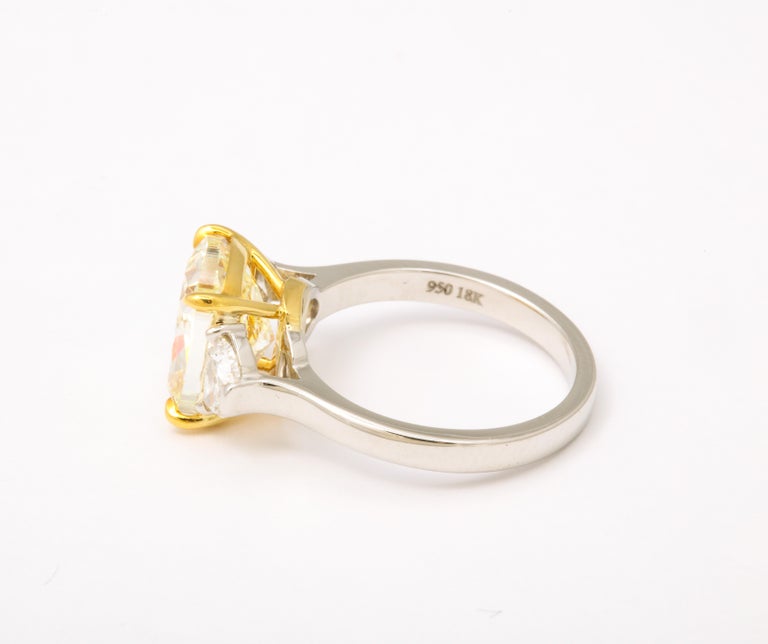 GIA Certified 5 Carat Fancy Light Yellow Cushion Cut Diamond Ring