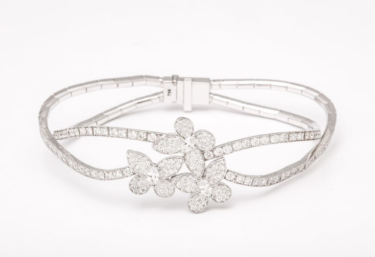 https://a.1stdibscdn.com/triple-butterfly-diamond-bracelet-for-sale-picture-5/j_415/j_154513021650038173903/6R1A6719_master.jpg?width=768