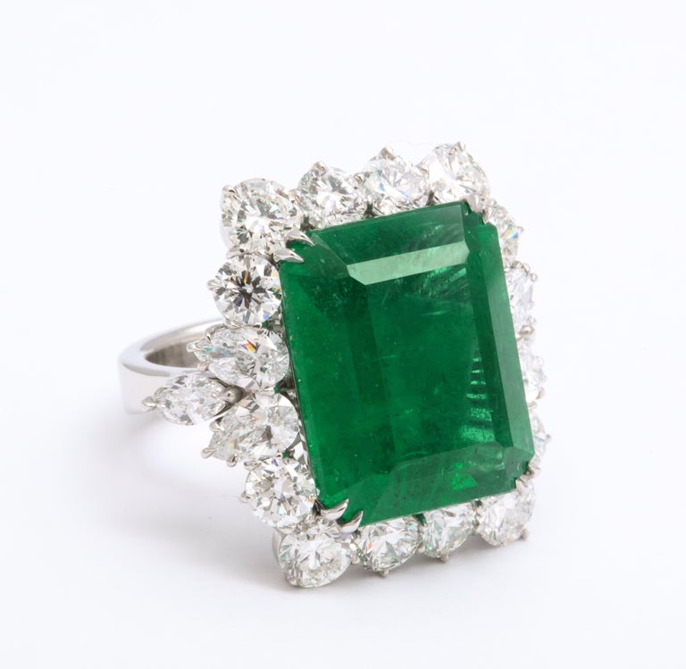 https://a.1stdibscdn.com/emerald-and-diamond-cocktail-ring-for-sale-picture-5/j_415/1612454599188/6R1A6795_master.jpg?width=768