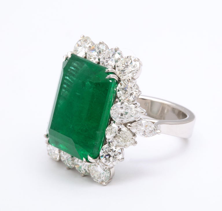 https://a.1stdibscdn.com/emerald-and-diamond-cocktail-ring-for-sale-picture-7/j_415/1612454607225/6R1A6798_master.jpg?width=768