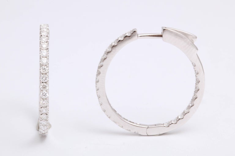https://a.1stdibscdn.com/diamond-hoop-earrings-for-sale-picture-4/0/j_54005821542818672584/6R1A7009_master.jpg?width=768