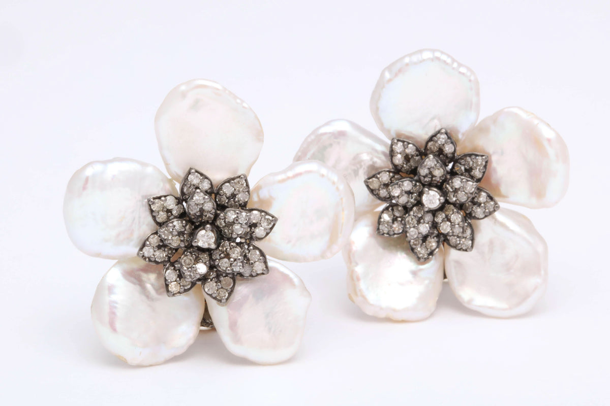 https://a.1stdibscdn.com/pearl-leaf-and-diamond-flower-earring-for-sale-picture-3/j_415/j_130060421628558032118/6R1A7166_master.jpg
