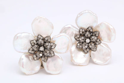 https://a.1stdibscdn.com/pearl-leaf-and-diamond-flower-earring-for-sale-picture-3/j_415/j_130060421628558032118/6R1A7166_master.jpg