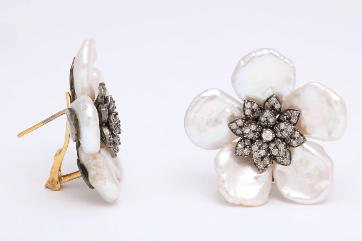 https://a.1stdibscdn.com/pearl-leaf-and-diamond-flower-earring-for-sale-picture-5/j_415/j_130060421628558032950/6R1A7168_master.jpg