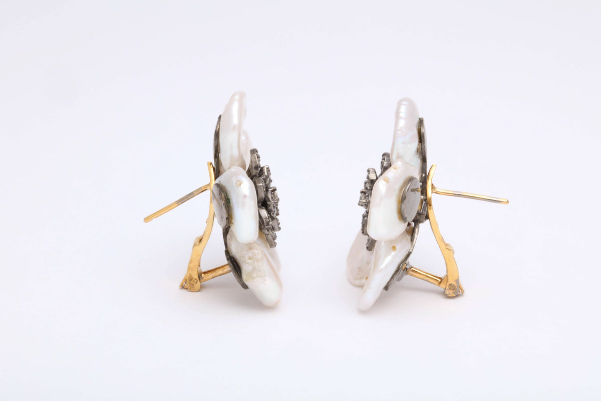 https://a.1stdibscdn.com/pearl-leaf-and-diamond-flower-earring-for-sale-picture-7/j_415/j_130060421628558033753/6R1A7170_master.jpg