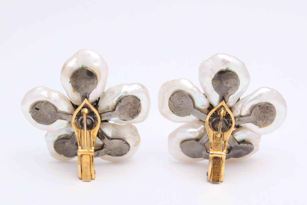 https://a.1stdibscdn.com/pearl-leaf-and-diamond-flower-earring-for-sale-picture-9/j_415/j_130060421628558035024/6R1A7172_master.jpg