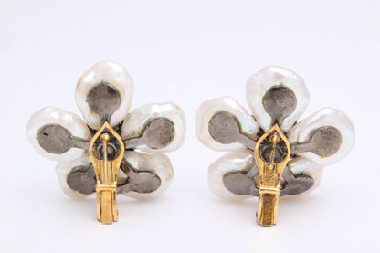 https://a.1stdibscdn.com/pearl-leaf-and-diamond-flower-earring-for-sale-picture-9/j_415/j_130060421628558035024/6R1A7172_master.jpg