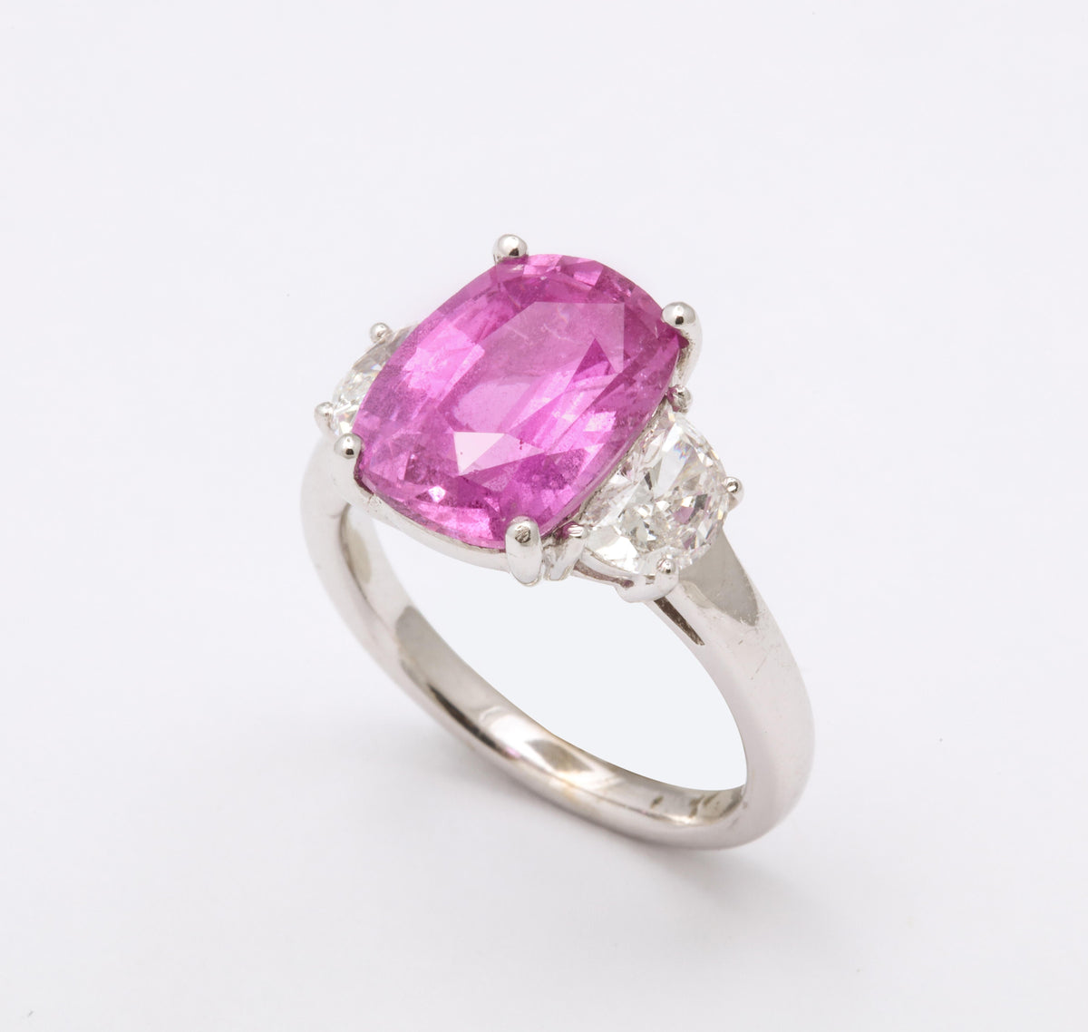 Vivid Pink 5 Carat Cushion Cut Sapphire Diamond Three-Stone Ring