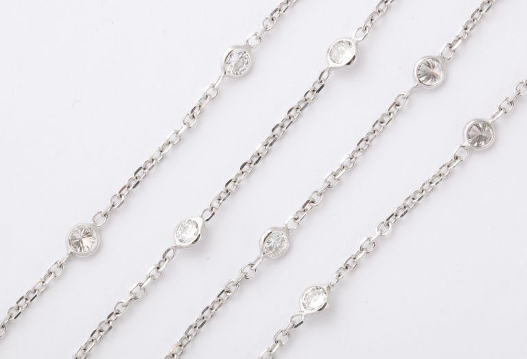 https://a.1stdibscdn.com/emerald-and-diamond-tassel-necklace-for-sale-picture-5/j_415/1605728020226/6R1A7459_master.jpg?width=768