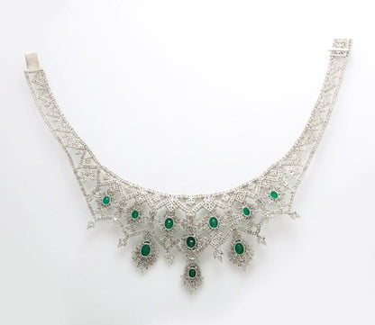 https://a.1stdibscdn.com/emerald-and-diamond-choker-necklace-for-sale-picture-4/j_415/j_183831221675869509694/6R1A7837_master.jpg?width=768