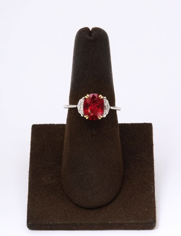 https://a.1stdibscdn.com/vivid-red-ruby-and-diamond-ring-for-sale-picture-3/j_415/j_143152421640712145579/6R1A8282_master.jpg?width=768