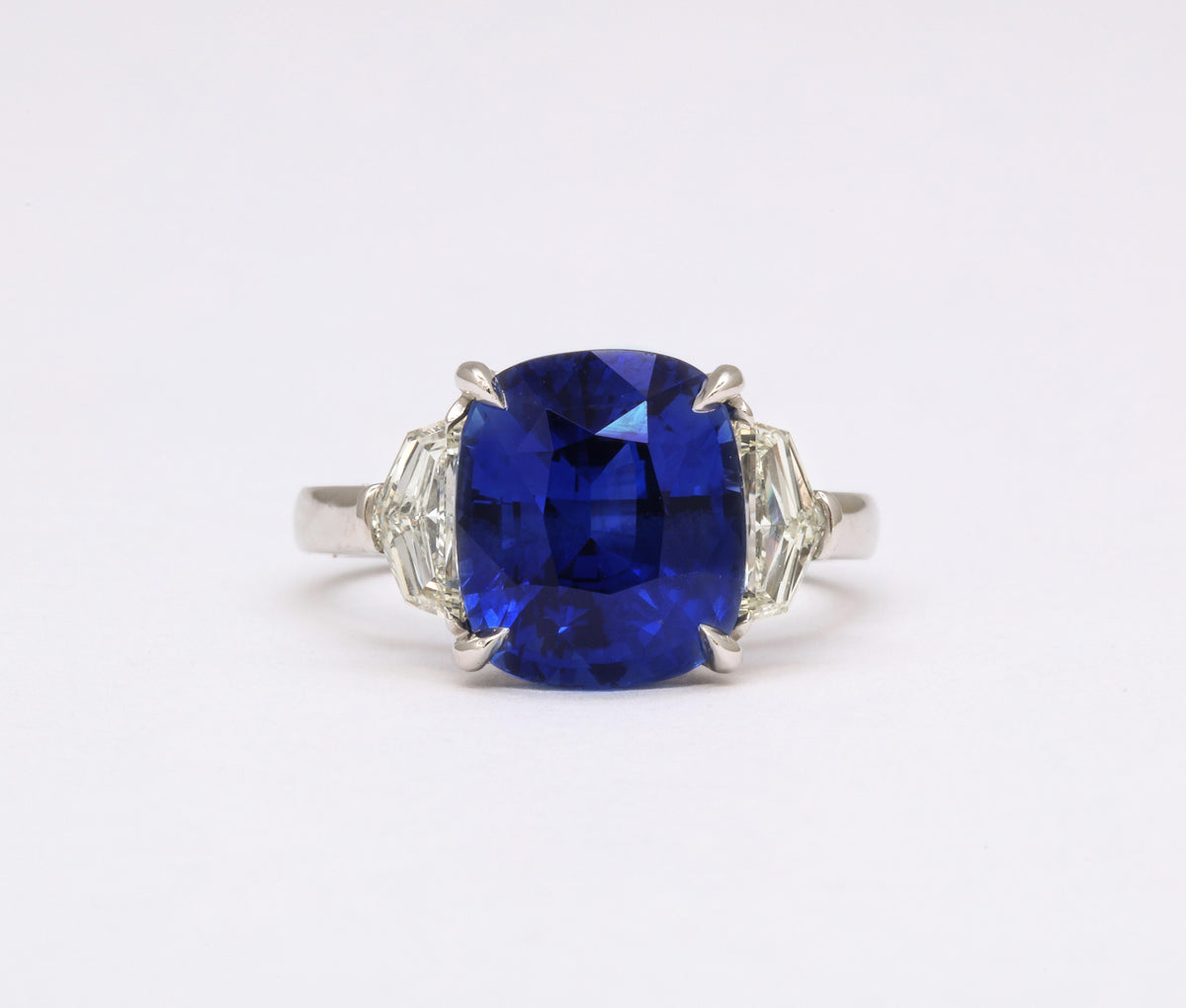 https://a.1stdibscdn.com/7-carat-cushion-cut-sapphire-and-diamond-ring-for-sale-picture-4/j_415/j_144397121641926942048/6R1A8303_master.jpg