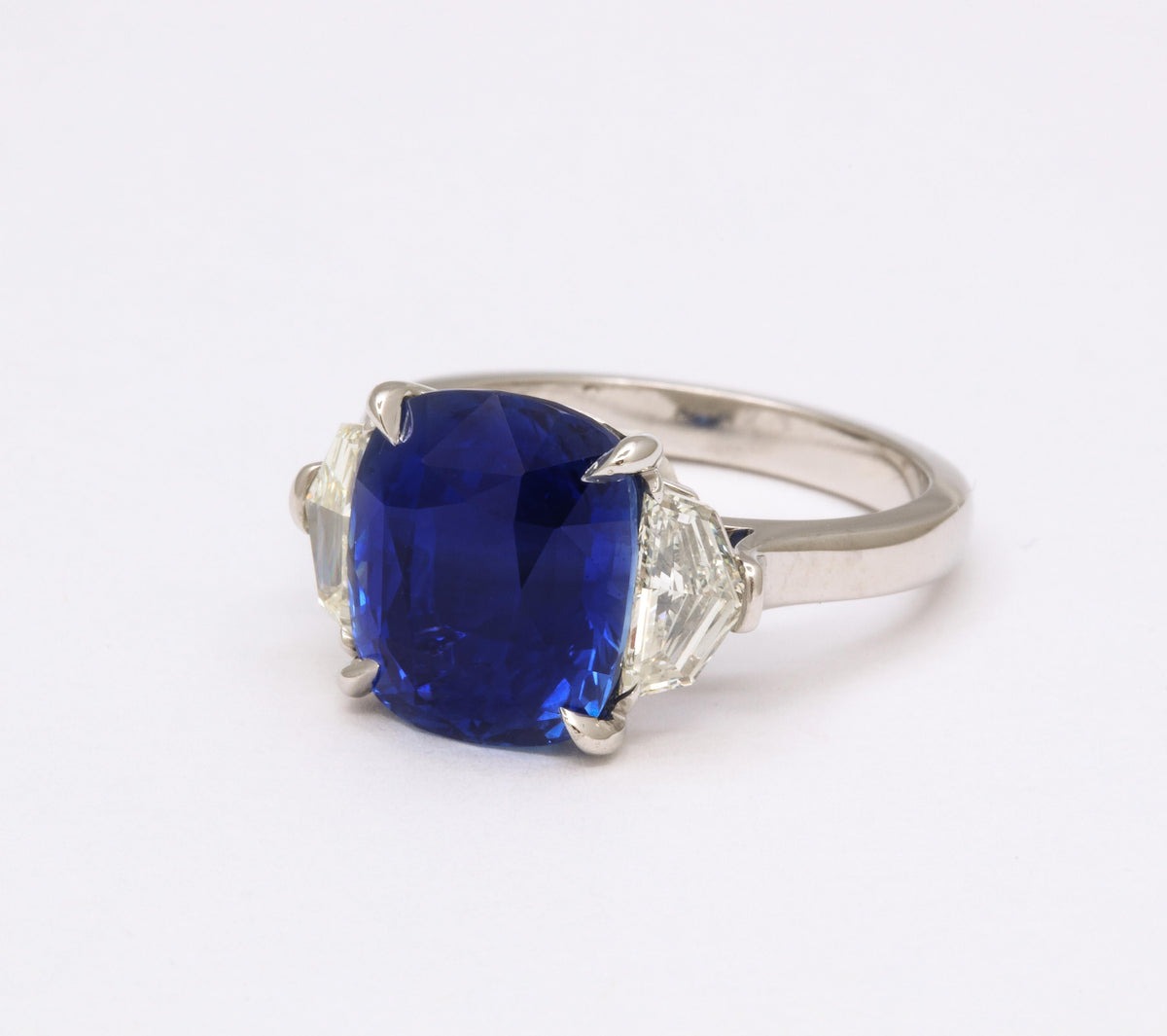 https://a.1stdibscdn.com/7-carat-cushion-cut-sapphire-and-diamond-ring-for-sale-picture-6/j_415/j_144397121641926941690/6R1A8305_master.jpg