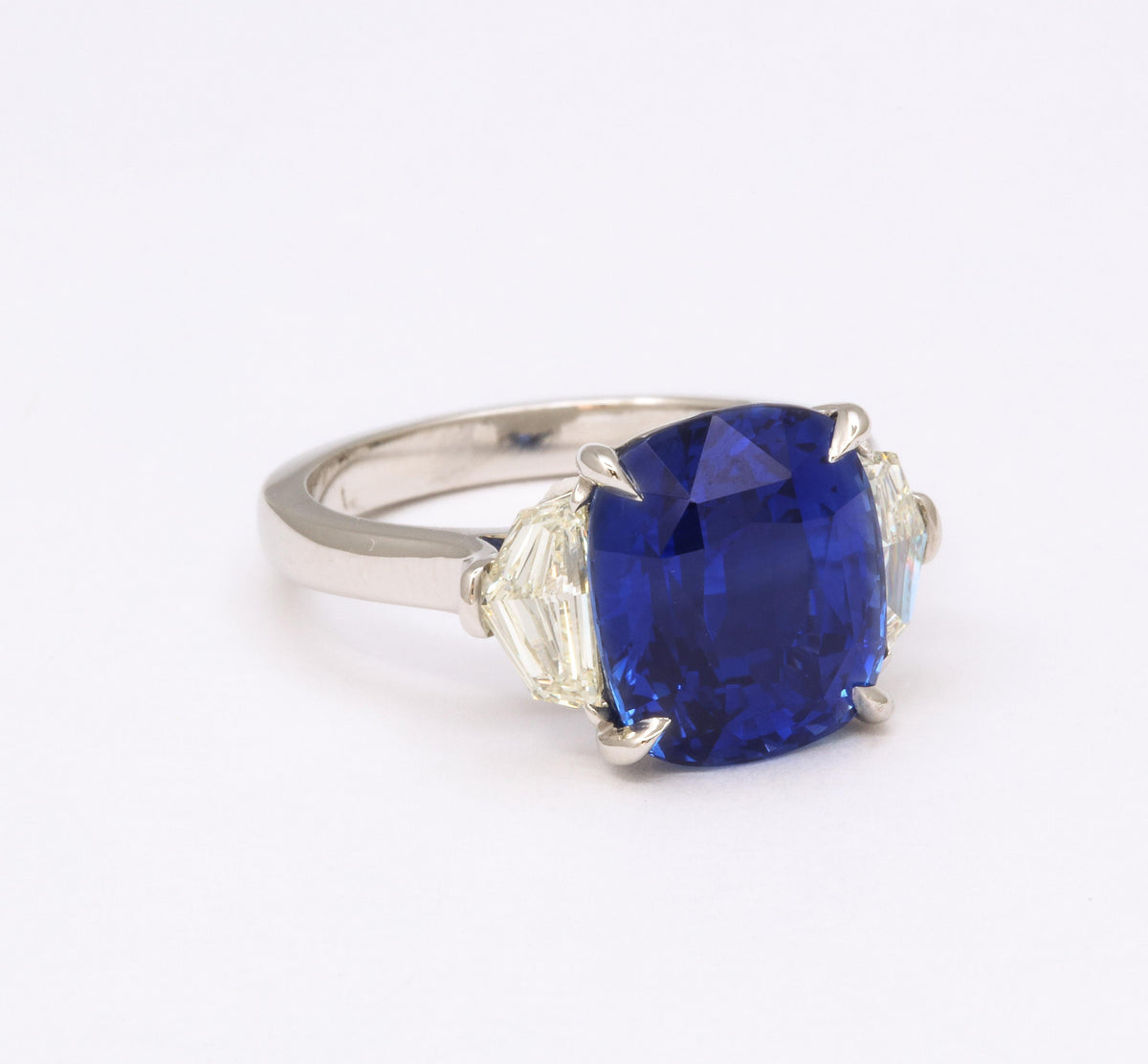 https://a.1stdibscdn.com/7-carat-cushion-cut-sapphire-and-diamond-ring-for-sale-picture-8/j_415/j_144397121641926940334/6R1A8308_master.jpg