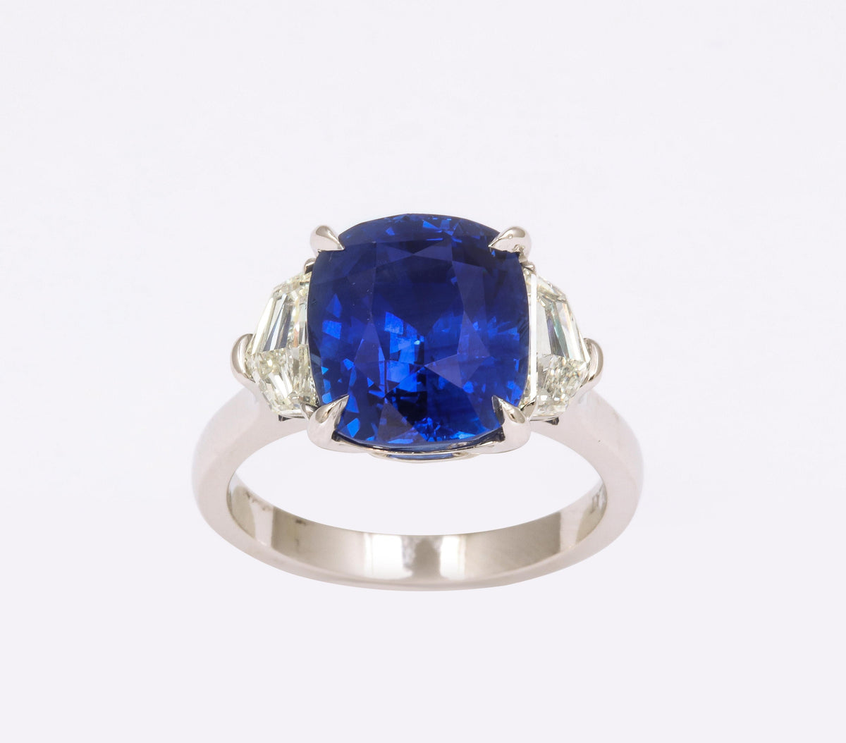 https://a.1stdibscdn.com/7-carat-cushion-cut-sapphire-and-diamond-ring-for-sale-picture-10/j_415/j_144397121641926939753/6R1A8310_master.jpg