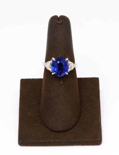 https://a.1stdibscdn.com/6-carat-oval-blue-sapphire-and-diamond-ring-for-sale-picture-3/j_415/j_144397421641927203913/6R1A8326_master.jpg