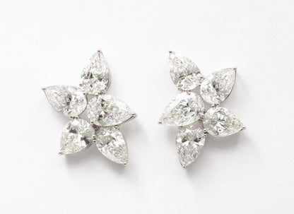 https://a.1stdibscdn.com/diamond-cluster-earrings-for-sale-picture-3/j_415/j_145871221643387926778/6R1A8360_master.jpg?width=768