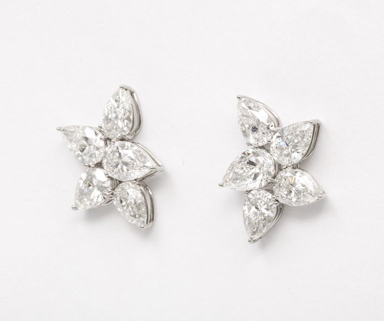 https://a.1stdibscdn.com/diamond-cluster-earrings-for-sale-picture-5/j_415/j_145871221643387926643/6R1A8364_master.jpg?width=768