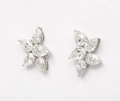 https://a.1stdibscdn.com/diamond-cluster-earrings-for-sale-picture-5/j_415/j_145871221643387926643/6R1A8364_master.jpg?width=768
