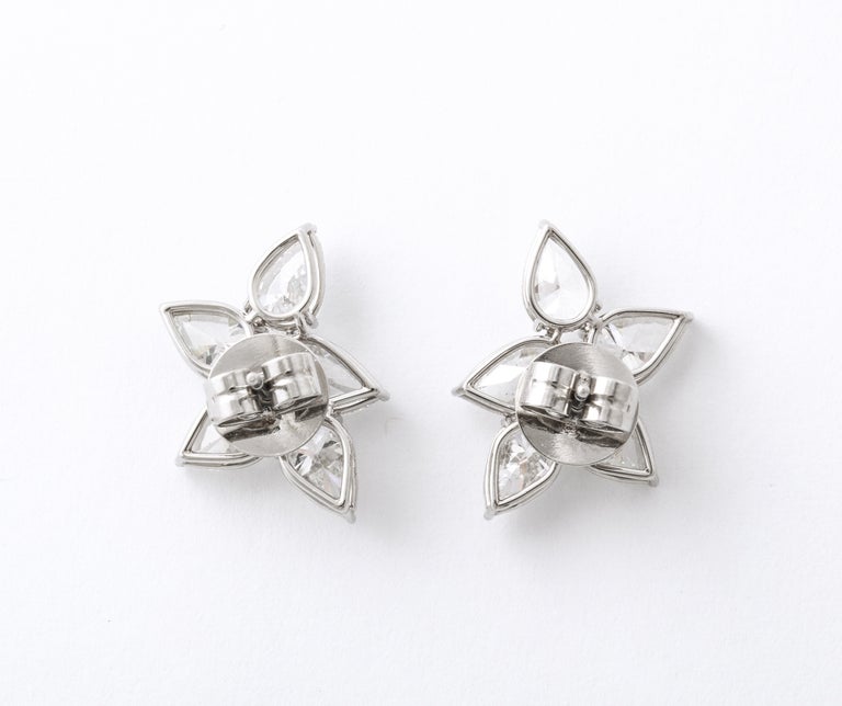 https://a.1stdibscdn.com/diamond-cluster-earrings-for-sale-picture-7/j_415/j_145871221643387929222/6R1A8367_master.jpg?width=768