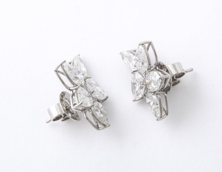 https://a.1stdibscdn.com/diamond-cluster-earrings-for-sale-picture-9/j_415/j_145871221643387926826/6R1A8369_master.jpg?width=768