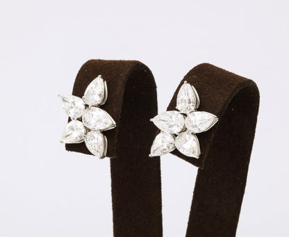 Exquisite 8.29 Carat Pear Shape Diamond Cluster Platinum Clip Earrings