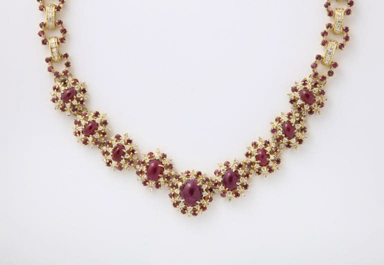 https://a.1stdibscdn.com/ruby-and-diamond-necklace-and-earring-set-for-sale-picture-3/j_415/j_229927221717077968826/6R1A8599_master.jpg?width=768