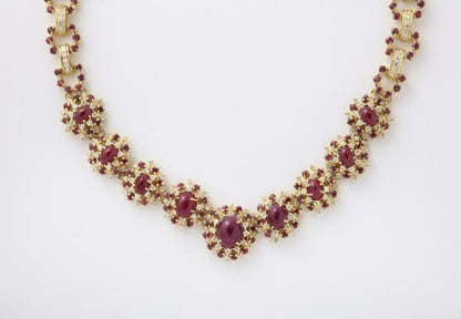 https://a.1stdibscdn.com/ruby-and-diamond-necklace-and-earring-set-for-sale-picture-3/j_415/j_229927221717077968826/6R1A8599_master.jpg?width=768