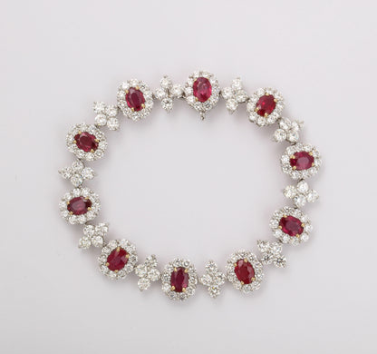 Elegant 9.20ct Oval Ruby and 14.56ct Diamond Platinum Link Bracelet