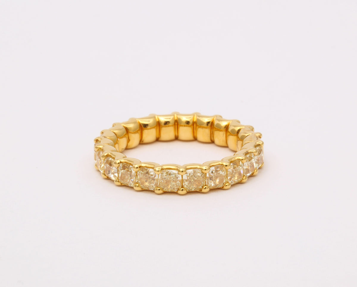 https://a.1stdibscdn.com/yellow-diamond-eternity-band-for-sale-picture-8/j_415/j_202927821694025265227/6R1A8676_master.jpg