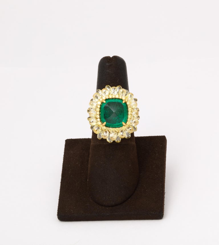https://a.1stdibscdn.com/5-carat-sugarloaf-cabochon-emerald-and-yellow-diamond-ring-for-sale-picture-3/j_415/j_202926121694024693697/6R1A8711_master.jpg?width=768