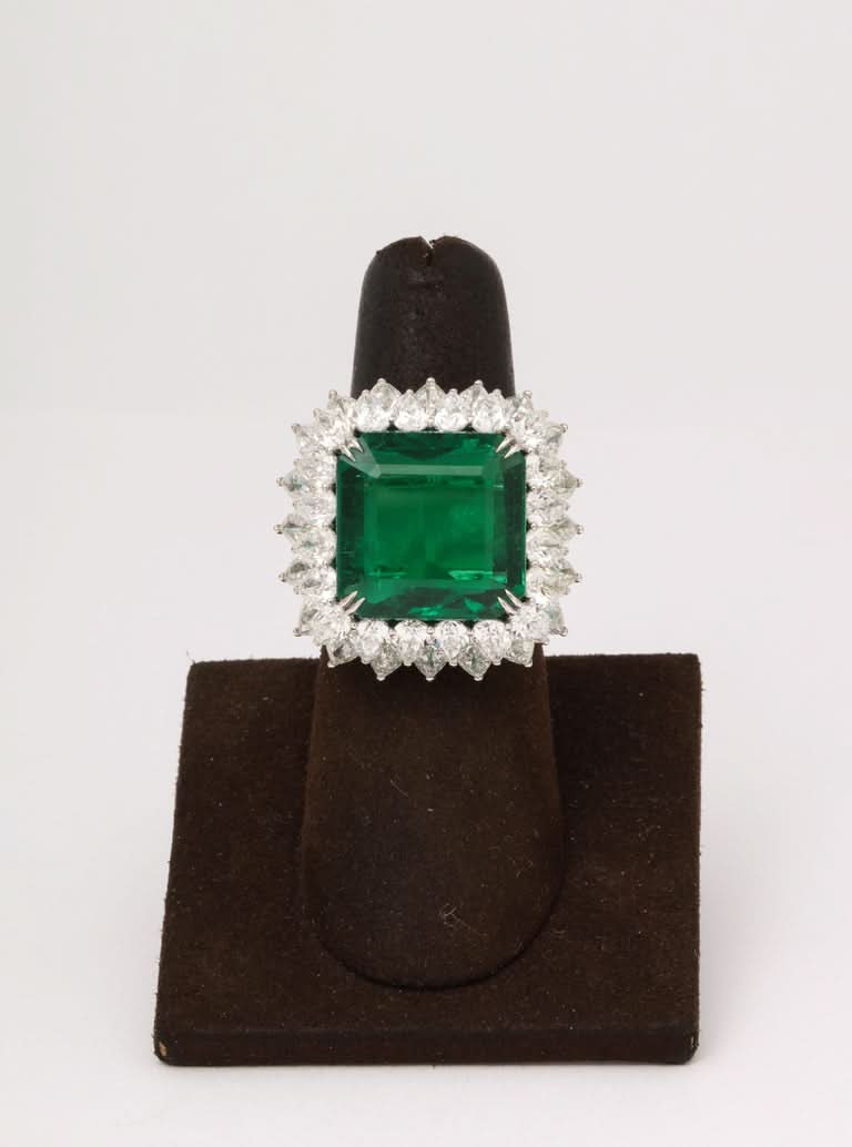 https://a.1stdibscdn.com/13-carat-emerald-and-diamond-ring-for-sale-picture-5/j_415/j_203160921694195656710/6R1A8732_master.jpg?width=768