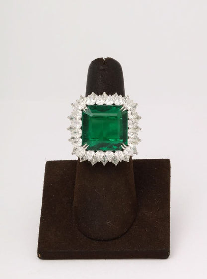 https://a.1stdibscdn.com/13-carat-emerald-and-diamond-ring-for-sale-picture-5/j_415/j_203160921694195656710/6R1A8732_master.jpg?width=768