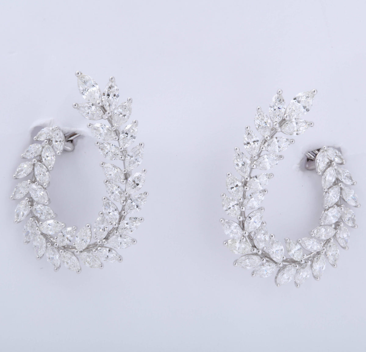 https://a.1stdibscdn.com/marquise-diamond-swirl-earring-for-sale-picture-5/0/j_45216831530288146896/6R1A9119_master.jpg