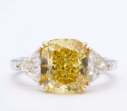 https://a.1stdibscdn.com/gia-certified-4-carat-fancy-intense-yellow-diamond-ring-for-sale-picture-3/j_415/1598973560110/6R1A9299_master.jpg