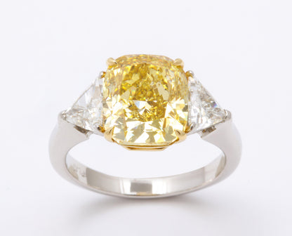 GIA Certified 4 Carat Fancy Intense Yellow Diamond Platinum Ring