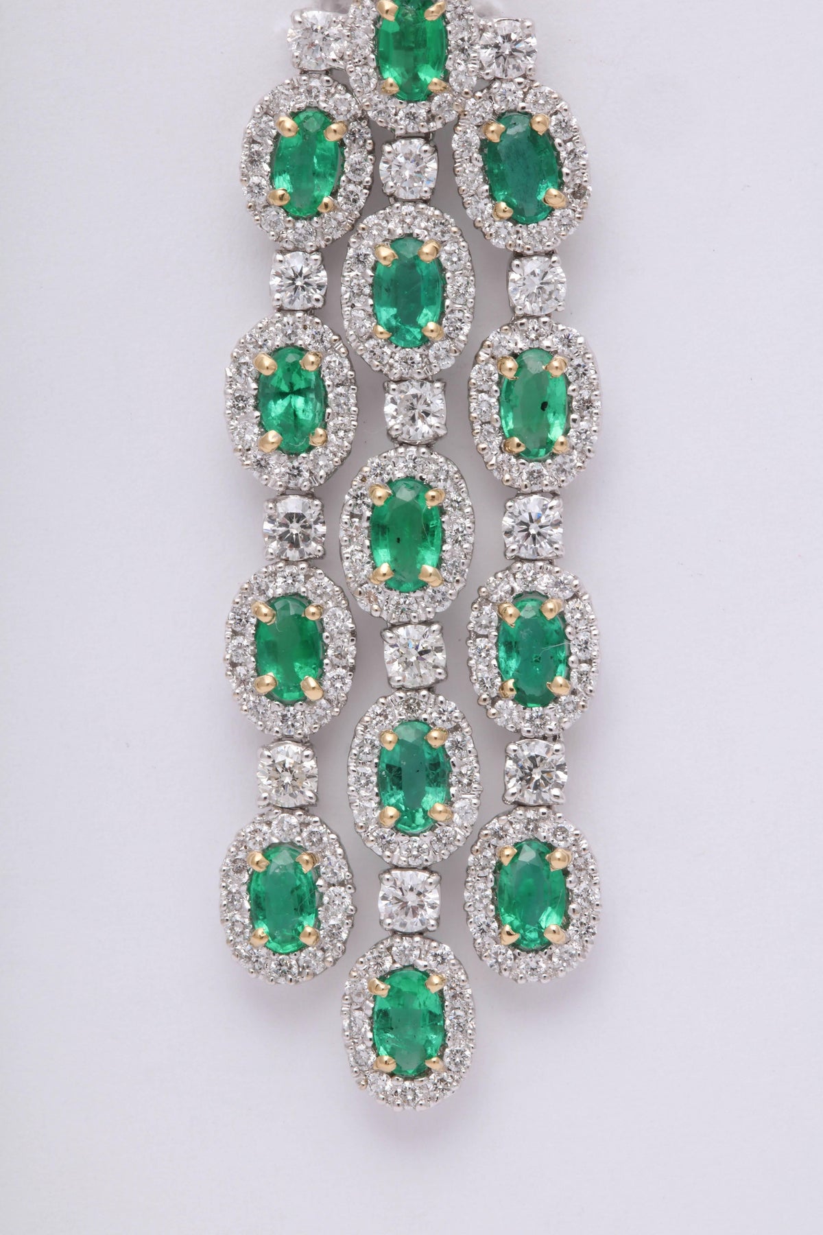 https://a.1stdibscdn.com/green-emerald-chandelier-earrings-for-sale-picture-7/0/j_42665231525894038438/6R1A9340_master.jpg