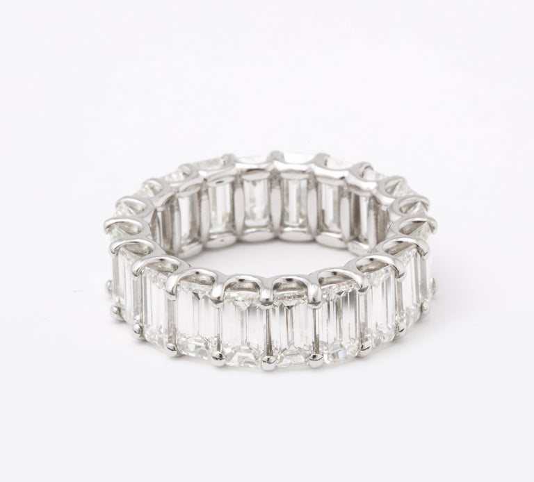 https://a.1stdibscdn.com/emerald-cut-diamond-eternity-band-for-sale-picture-9/j_415/j_168334821661871441257/6R1A9417_master.jpg?width=768