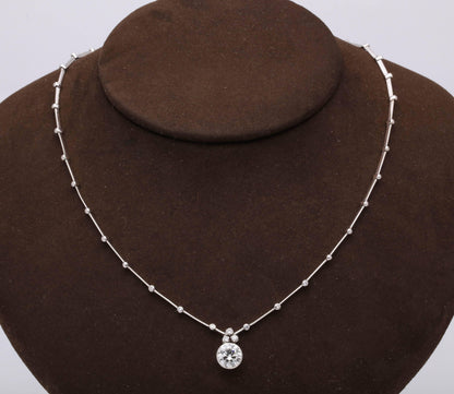 https://a.1stdibscdn.com/round-diamond-solitaire-necklace-gia-certified-for-sale-picture-4/0/j_42665831525894122586/6R1A9447_master.jpg