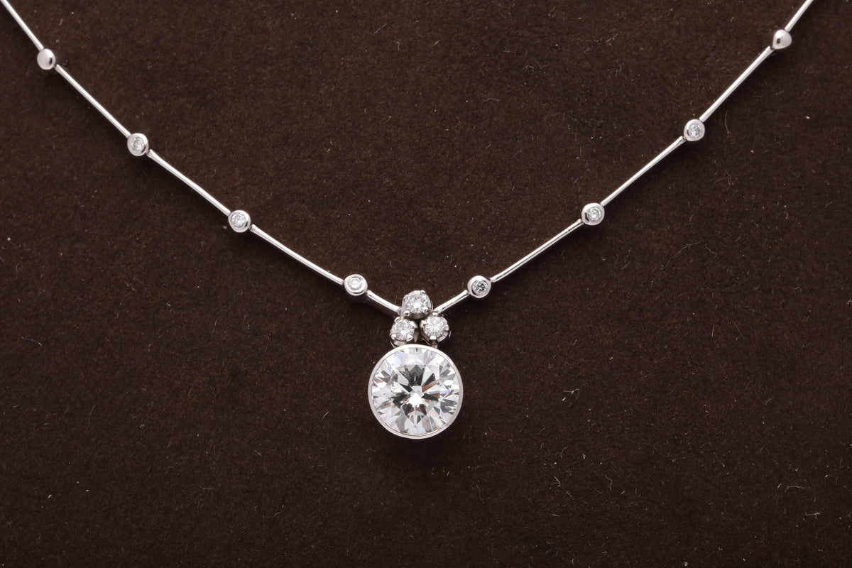 https://a.1stdibscdn.com/round-diamond-solitaire-necklace-gia-certified-for-sale-picture-9/0/j_42665831525894134700/6R1A9458_master.jpg