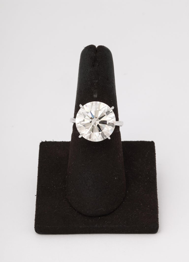 https://a.1stdibscdn.com/11-carat-round-diamond-engagement-ring-for-sale-picture-3/j_415/j_165034421658770700883/6R1A9535_master.jpg?width=768