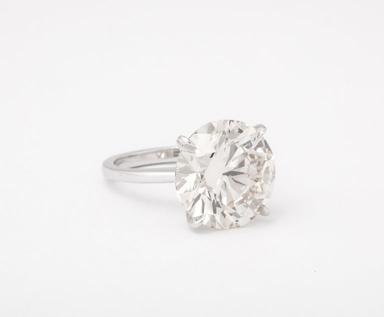 https://a.1stdibscdn.com/11-carat-round-diamond-engagement-ring-for-sale-picture-5/j_415/j_165034421658770700097/6R1A9534_master.jpg?width=768