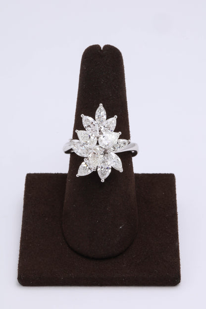 https://a.1stdibscdn.com/diamond-cluster-ring-for-sale-picture-6/0/j_50847211539355653406/6R1A9569_master.jpg
