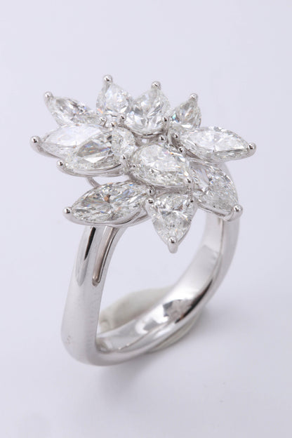 https://a.1stdibscdn.com/diamond-cluster-ring-for-sale-picture-3/0/j_50847211539355650252/6R1A9562_master.jpg