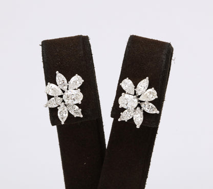 https://a.1stdibscdn.com/diamond-cluster-earrings-for-sale-picture-4/j_415/j_141445021639062293249/6R1A9894_master.jpg
