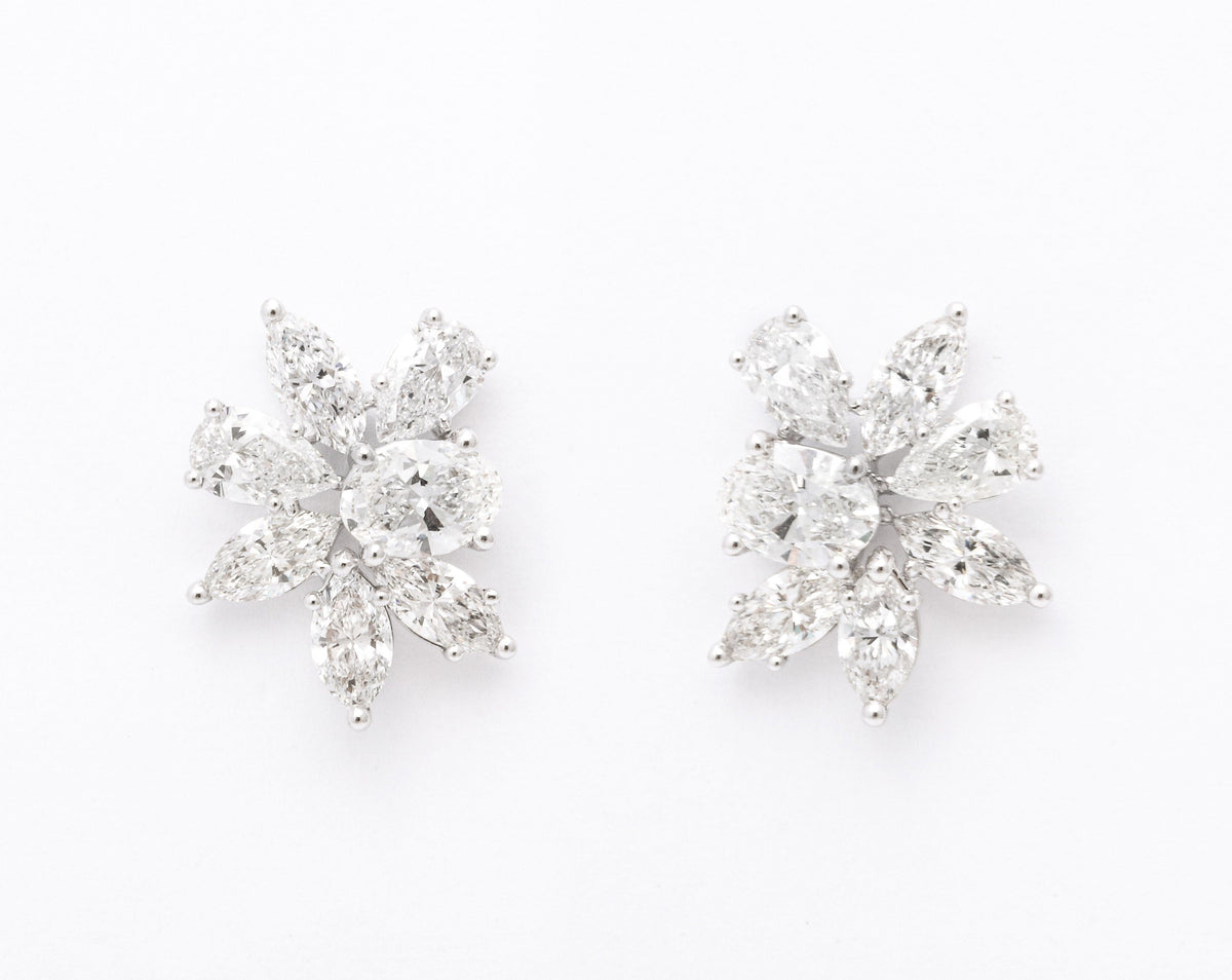 https://a.1stdibscdn.com/diamond-cluster-earrings-for-sale-picture-8/j_415/j_141445021639062296514/6R1A9903_master.jpg