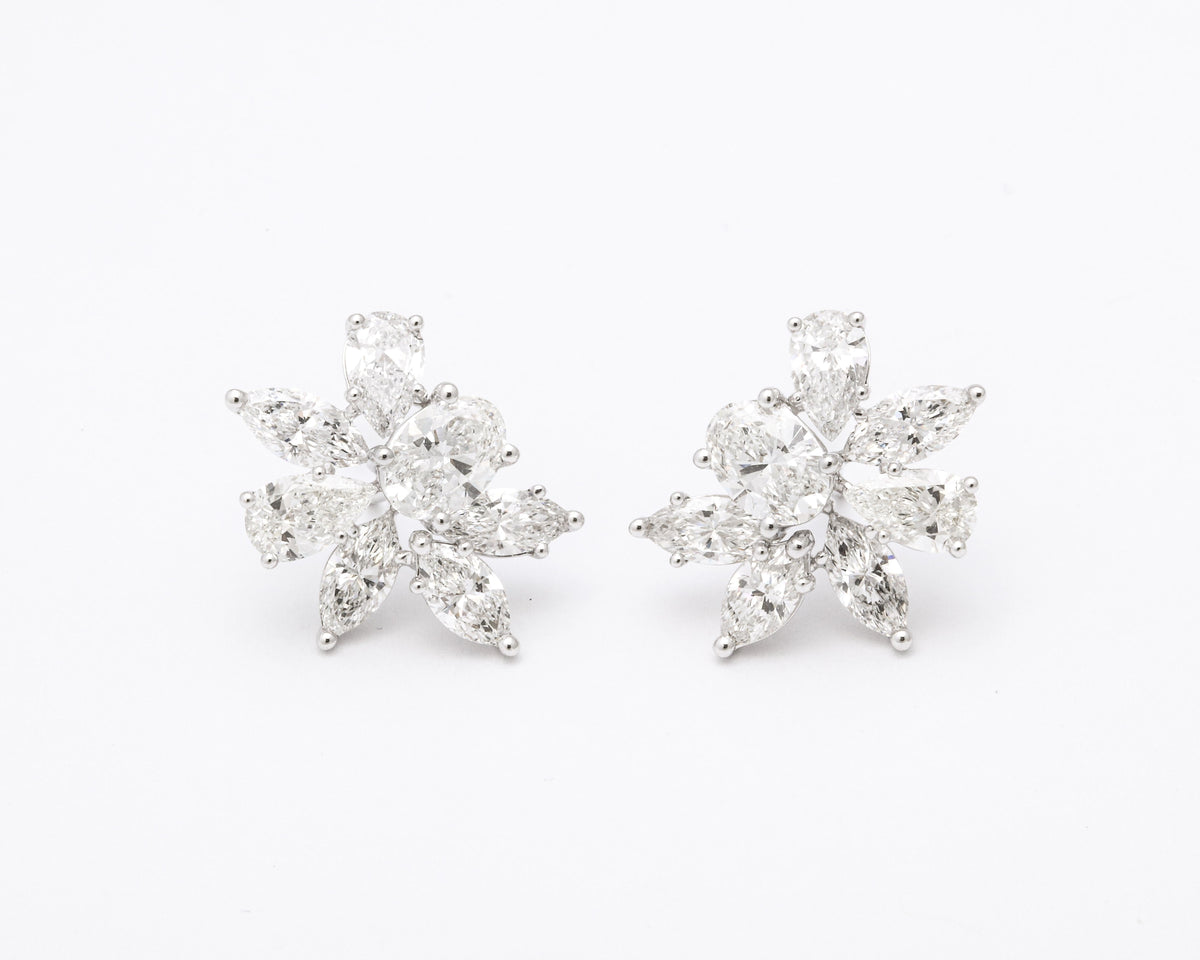 https://a.1stdibscdn.com/diamond-cluster-earrings-for-sale-picture-10/j_415/j_141445021664993677467/38F30A96_AC1D_403A_9D42_CAB06FC764F9_master.jpeg