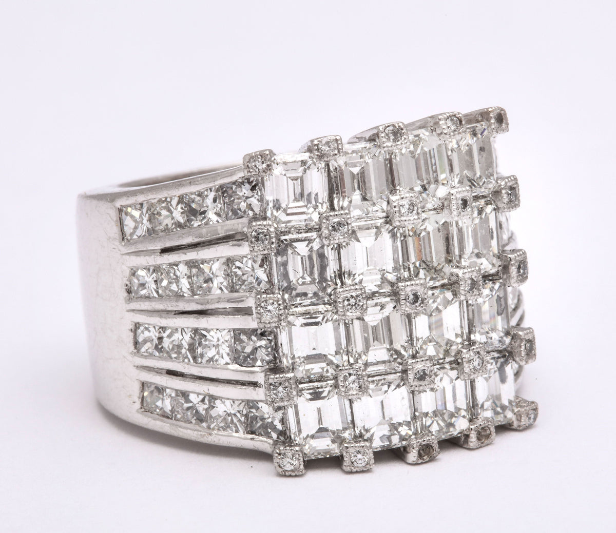 Wide Platinum Ring with Emerald and Princess Cut Diamonds